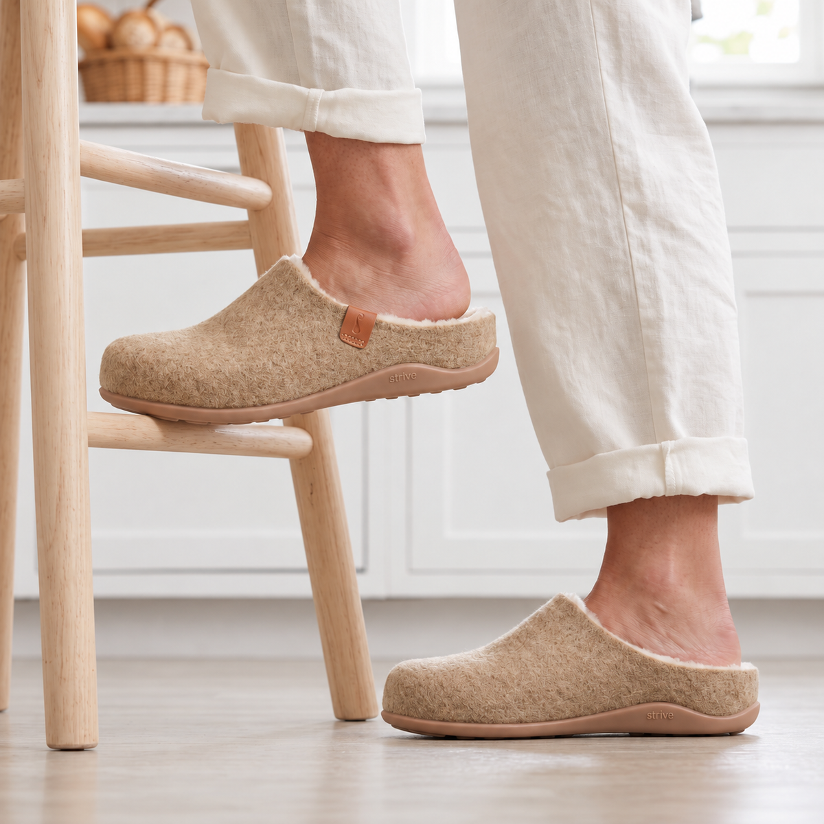 Woman wearing supportive orthotic slippers