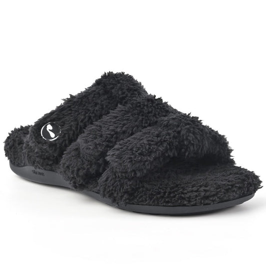 Strive women’s black orthotic slippers with fluffy cross straps and an open toe, shown from a side angle.