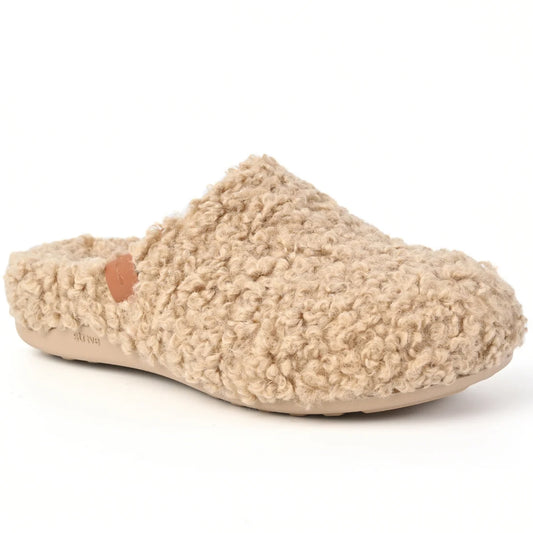 Strive Copenhagen II Curly women’s beige orthotic slipper with a textured upper, closed toe and open heel, shown from a front side angle.